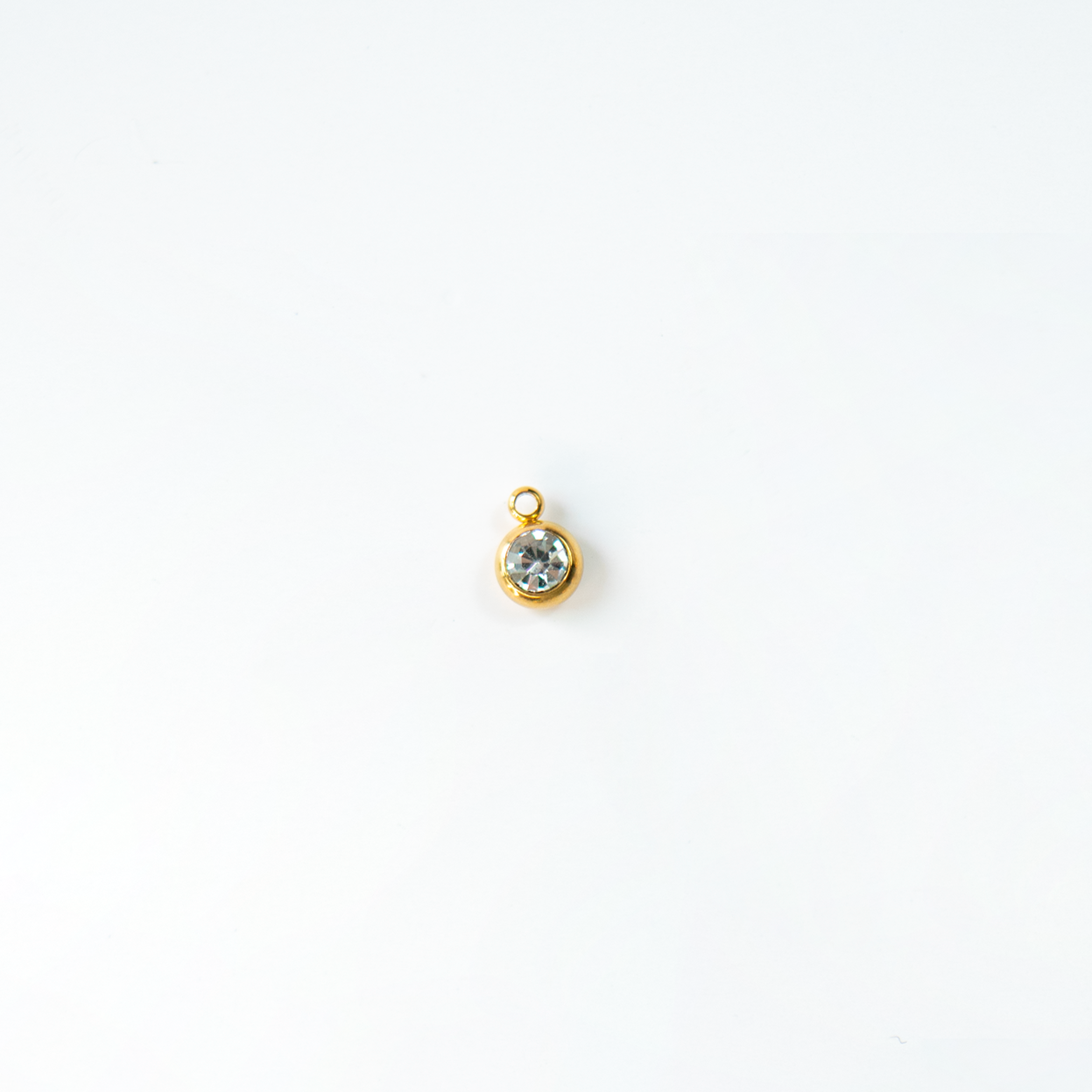 Charm del mes dorados