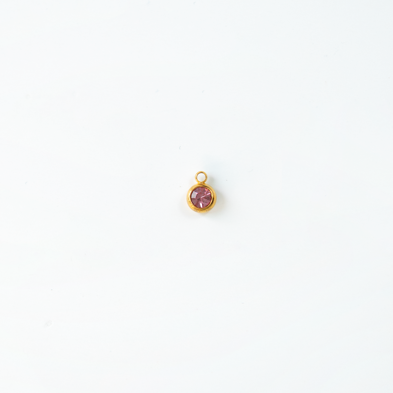 Charm del mes dorados