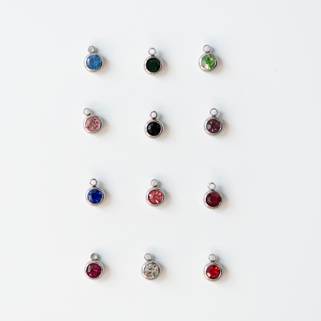 Charm del mes plateados