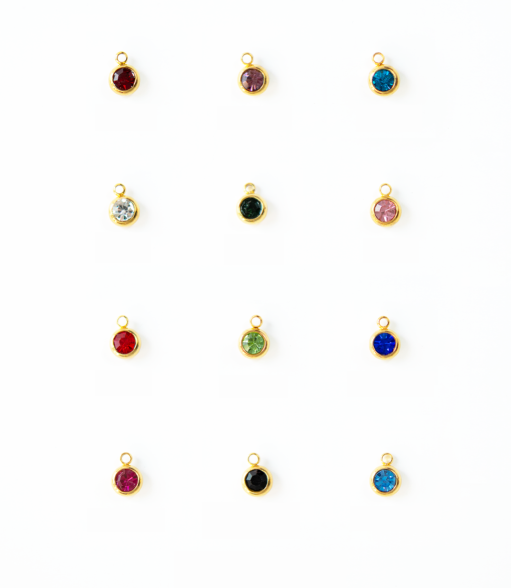 Charm del mes dorados