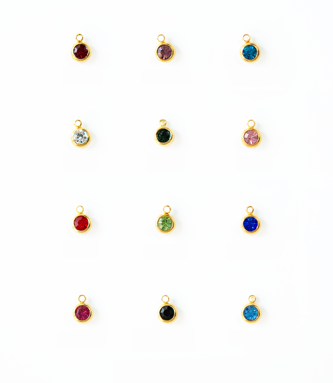 Charm del mes dorados