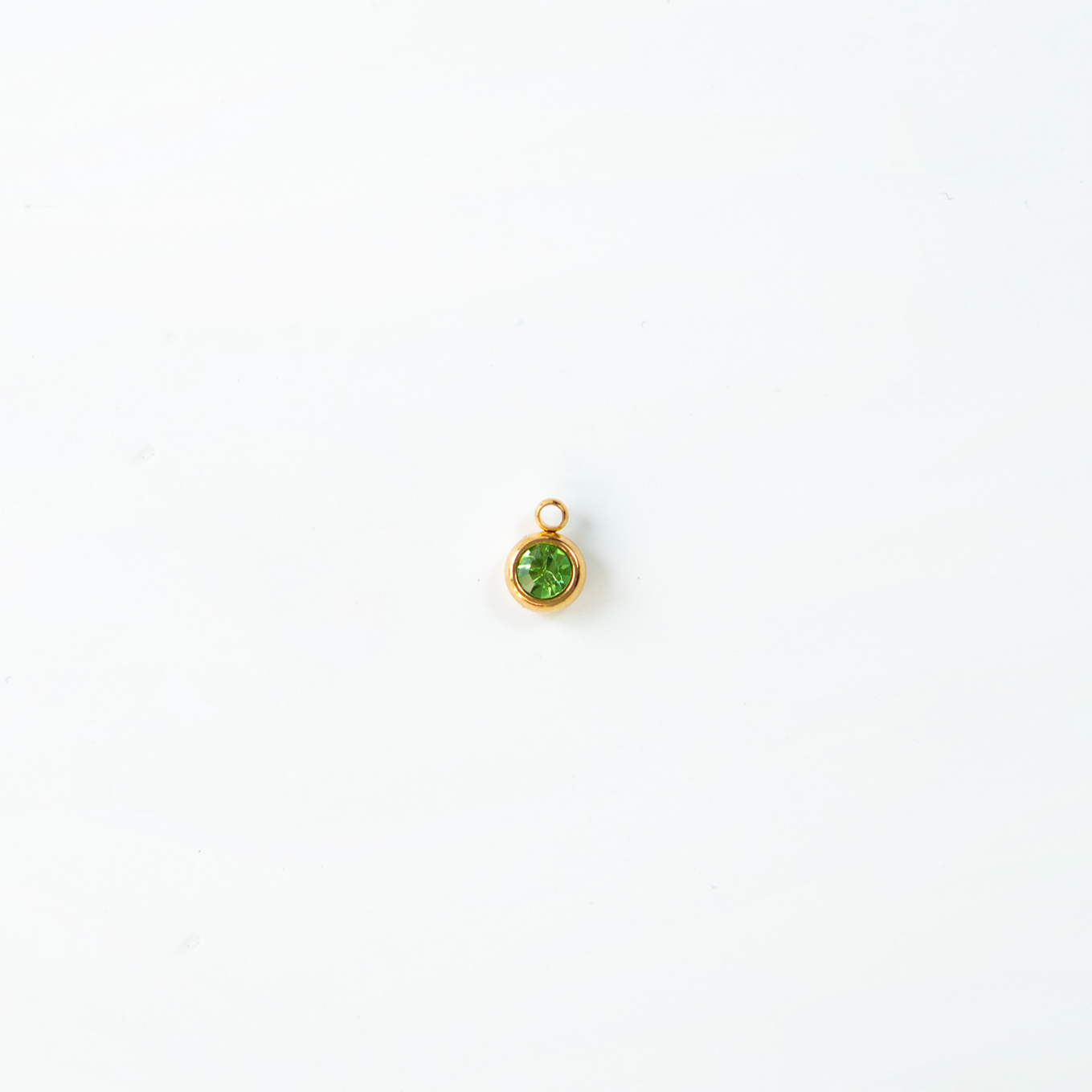 Charm del mes dorados