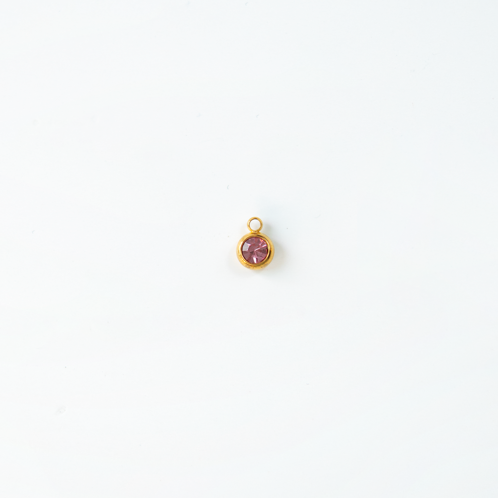 Charm del mes dorados