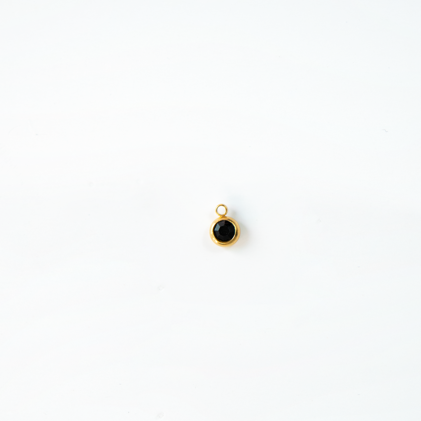 Charm del mes dorados