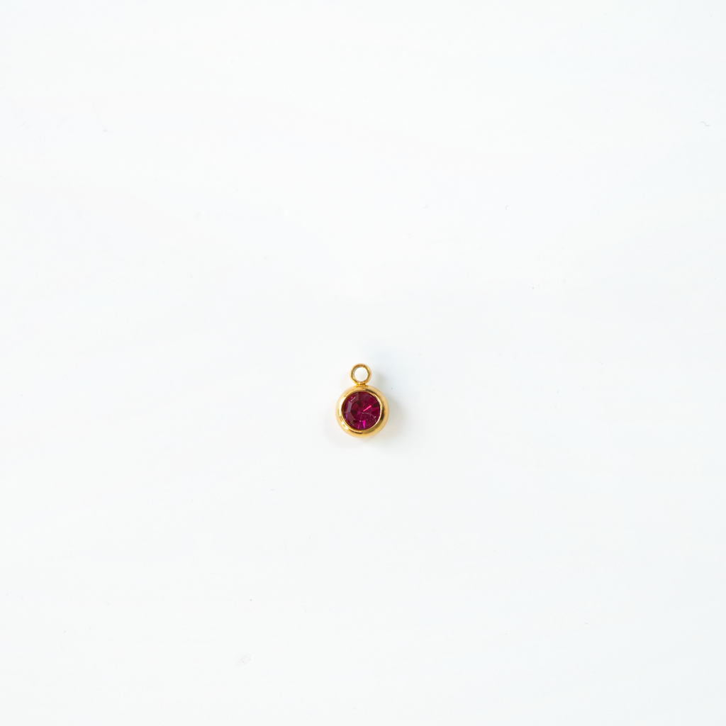 Charm del mes dorados