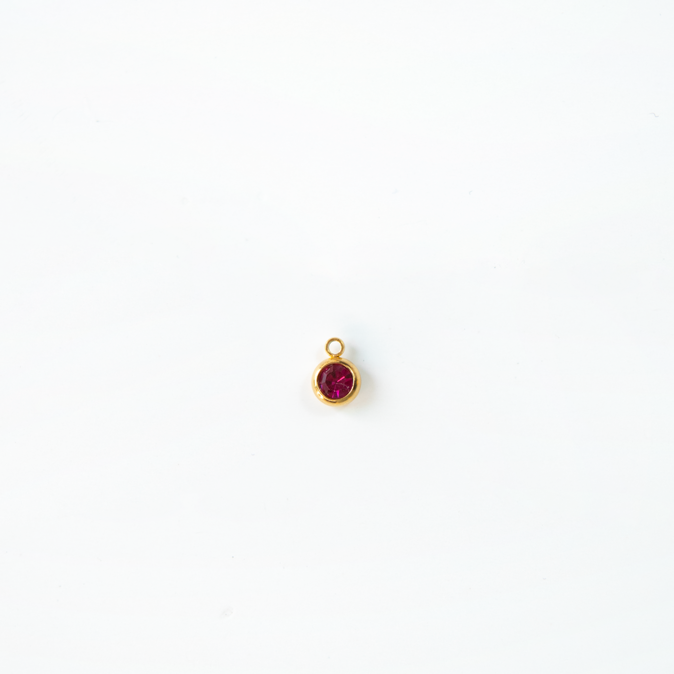 Charm del mes dorados